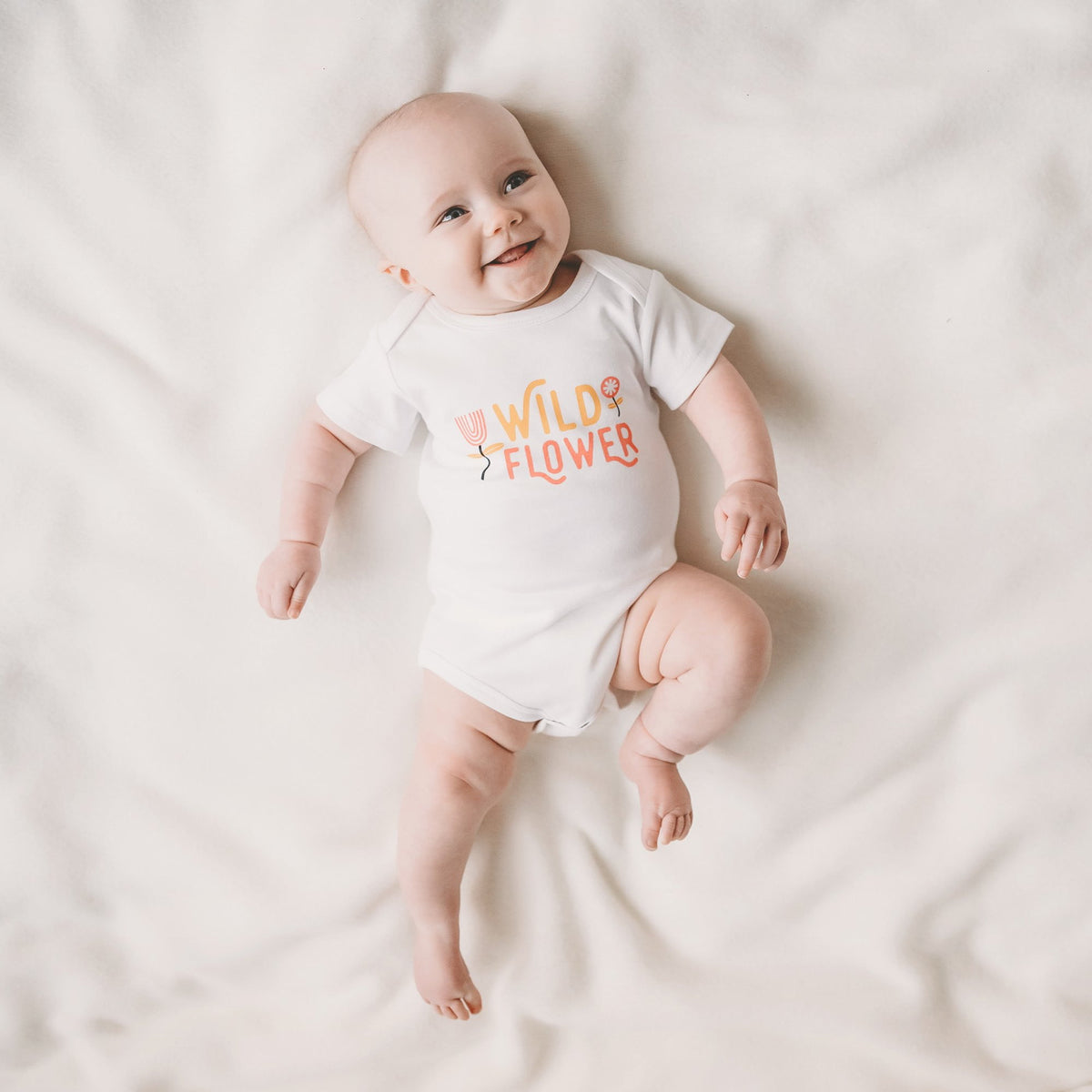 PRE-ORDER - Wild Flower baby bodysuit / onesie - Sweetpea and Co.