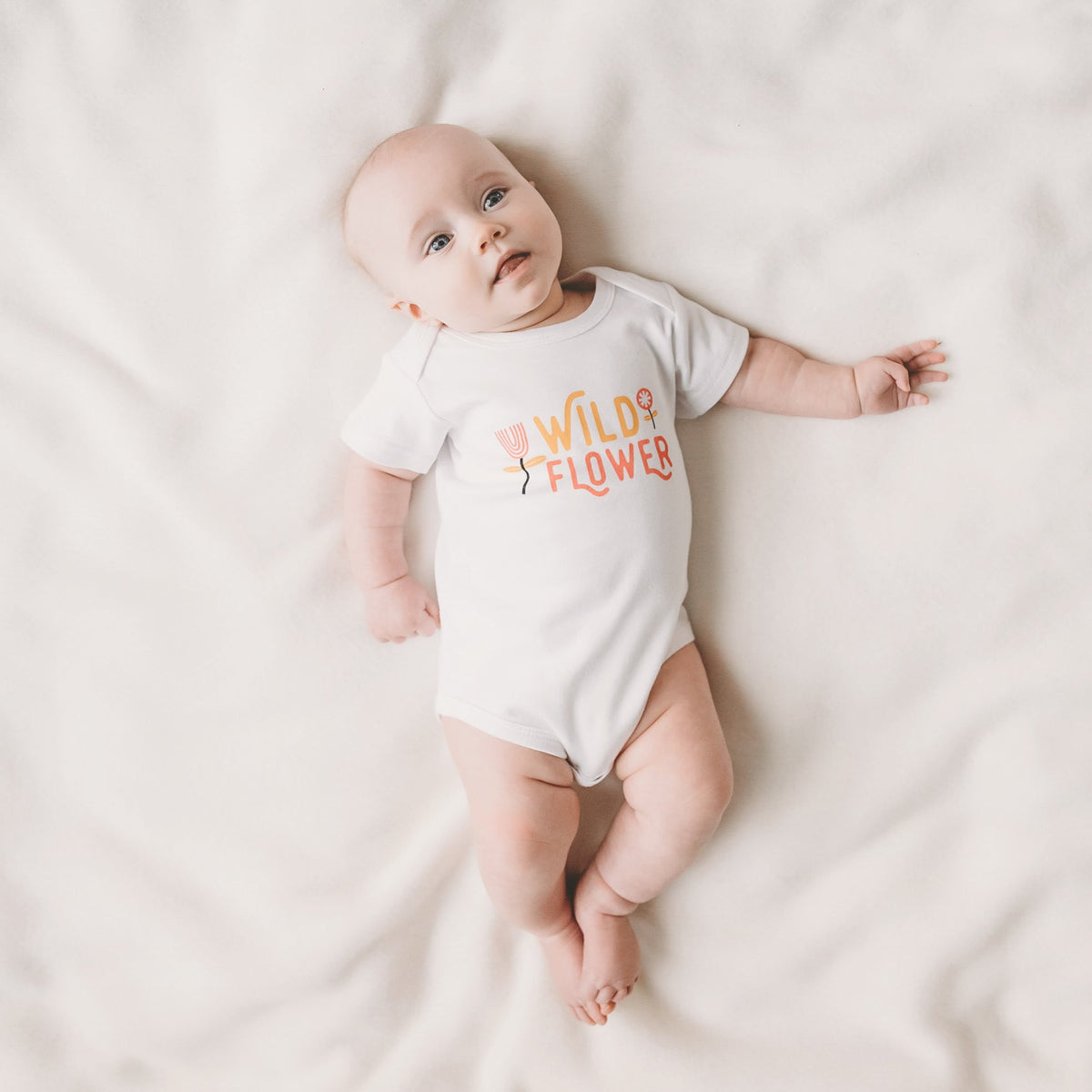 PRE-ORDER - Wild Flower baby bodysuit / onesie - Sweetpea and Co.