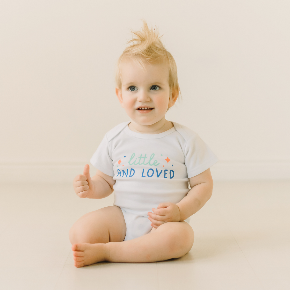 Little and Loved Baby Bodysuit