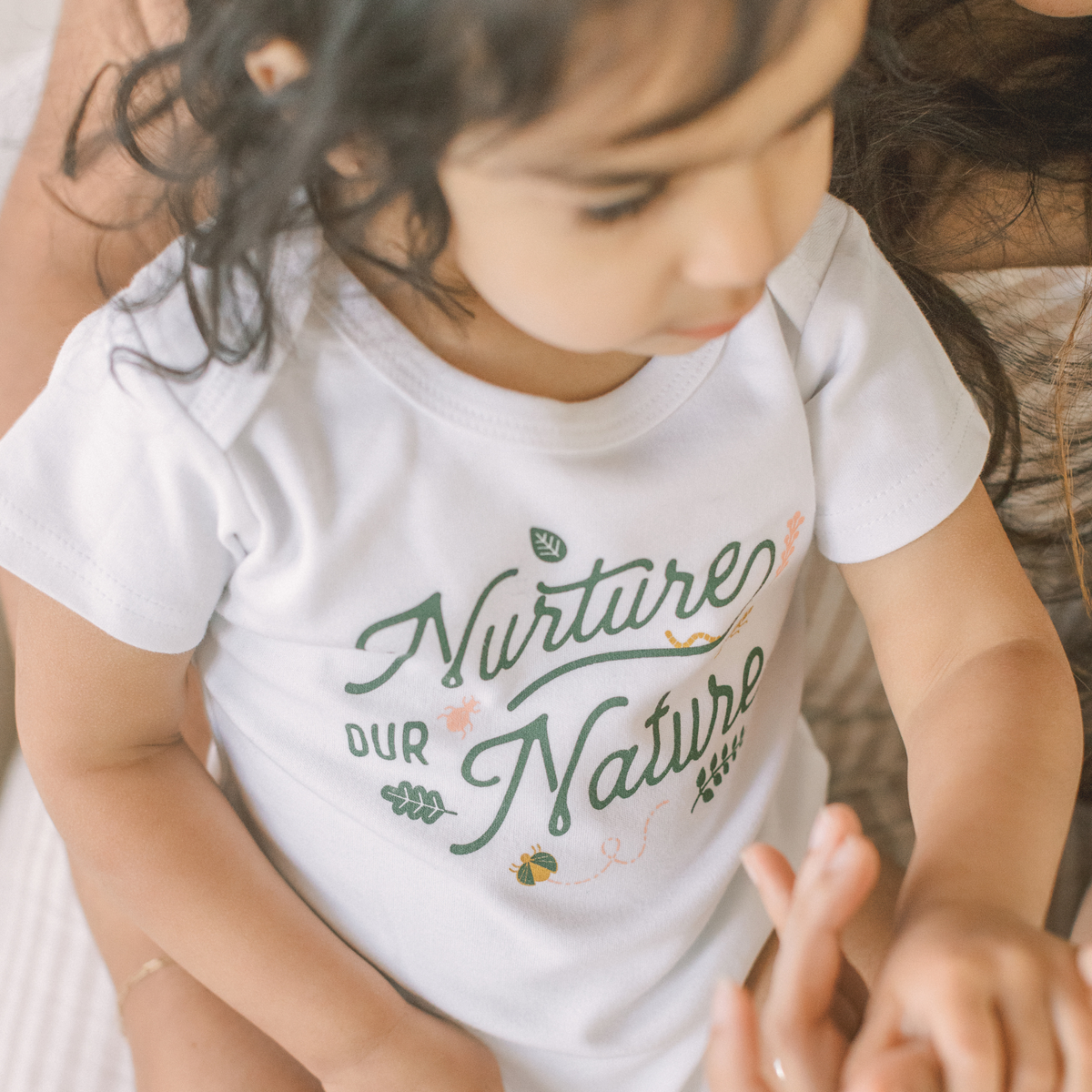 Nurture our Nature Baby Onesie