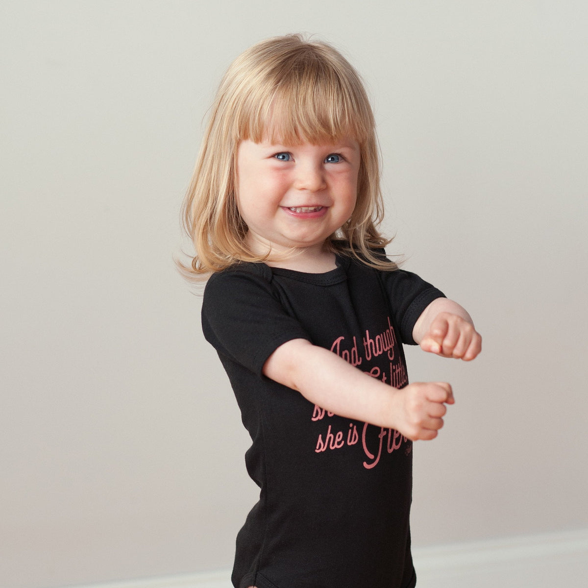 She is Fierce in Black Baby Bodysuit - Sweetpea and Co.