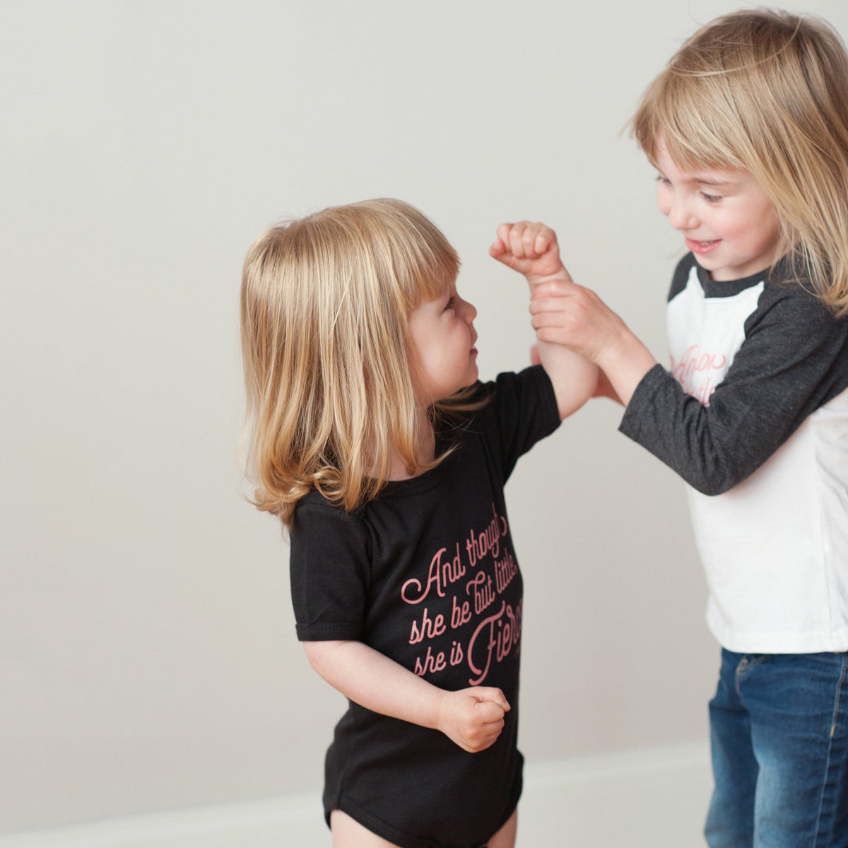 She is Fierce in Black Baby Bodysuit - Sweetpea and Co.